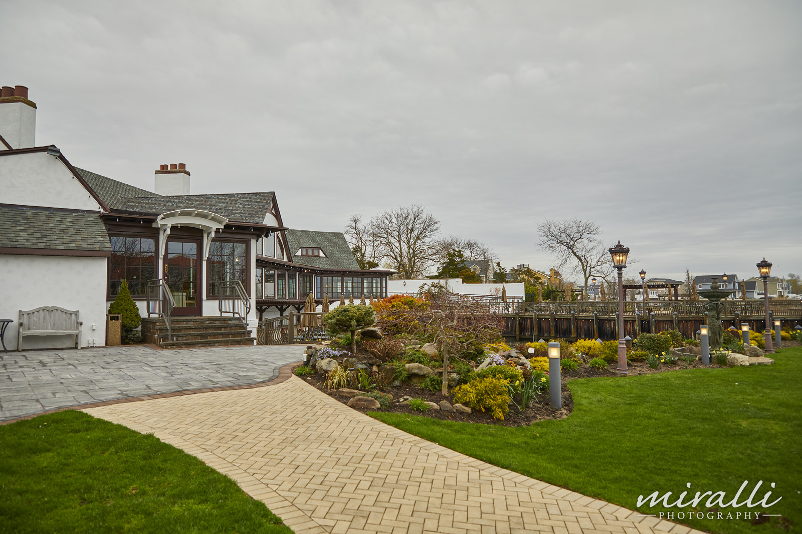 Garden Terrace at Riviera Waterfront Mansion Wedding Photos by Miralli Photography